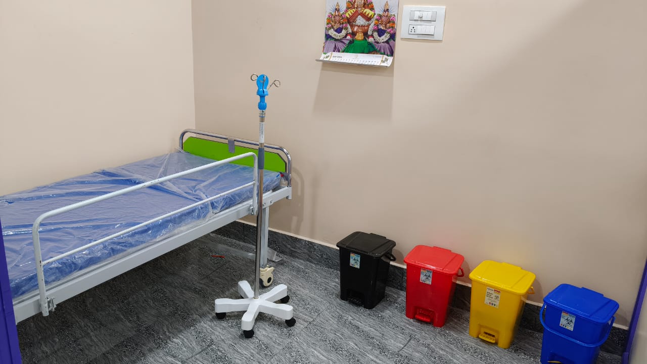 Patient ward with bed and clinical equipment